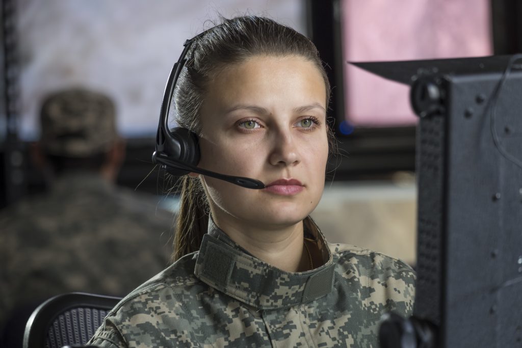 female drone operator on computer